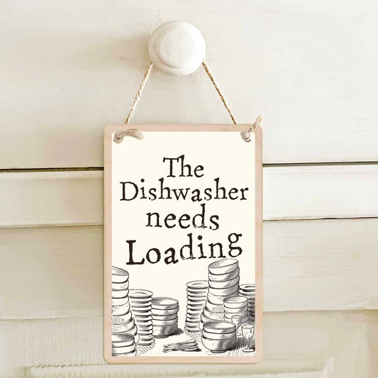 The dishwasher needs emptying / The dishwasher needs loading - Double-sided wooden mini sign.
Made from certified sustainable wood and printed on both sides with a fun, practical message and retro illustration.
15 × 10 cm sustainable wood, natural twine.
Light and durable, eco-friendly, ready to hang.
Made in Suffolk.