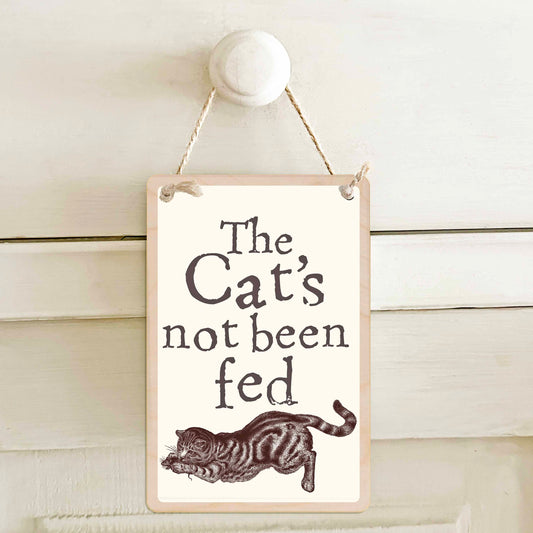 The Cat's been fed / The Cat's not been fed - Double-sided wooden mini sign.
Made from certified sustainable wood and printed on both sides with a fun, practical message and retro illustration.
15 × 10 cm sustainable wood, natural twine.
Light and durable, eco-friendly, ready to hang.
Made in Suffolk.