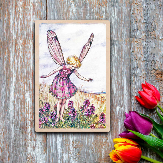 Wild Thyme Fairy by Cicely Mary Barker. Printed with vibrant colour and fine detail. Made to send, keep, or collect. Handmade in the UK since 2012.