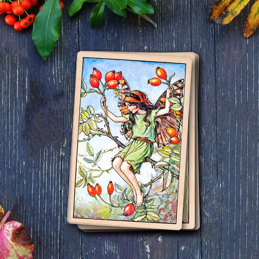 The Rosehip Fairy - Sustainable Card - Wooden Postcard
Original Flower Fairies™ illustration by Cicely Mary Barker, printed in Suffolk on sustainable wood. Made to send, keep, or display—an eco-friendly keepsake for fairy fans, garden lovers, and collectors.