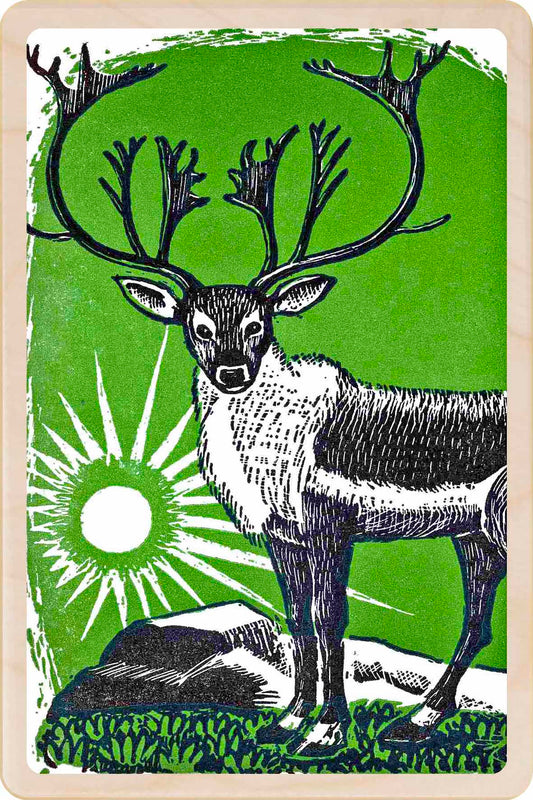 A wooden postcard featuring a linocut illustration of a reindeer with antlers, set against a green background with a sun motif. Winter Sun - Christmas Card – Wooden Postcard

Original Winter illustration ©Saturday Evening Post, printed on sustainable wood. A beautifully detailed postcard you can send, display, or tuck into a stocking.