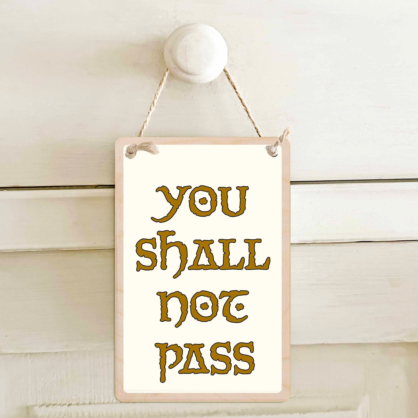 You shall not pass - Wooden mini sign. Gift for teenagers or anyone who like their privacy.

15 × 10 cm sustainable wood, natural twine.

Light and durable, eco-friendly, ready to hang.

Made in Suffolk.