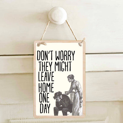 Don't worry, they might leave home one day - Wooden mini sign.

15 × 10 cm sustainable wood, natural twine.

Light and durable, eco-friendly, ready to hang.

Made in Suffolk.