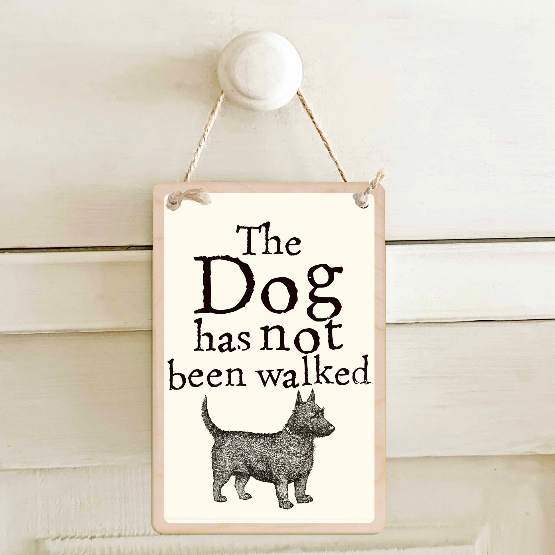 The Dog has been walked / The Dog has not been walked - Double-sided wooden mini sign.

Made from certified sustainable wood and printed on both sides with a fun, practical message and retro illustration.

15 × 10 cm sustainable wood, natural twine.

Light and durable, eco-friendly, ready to hang.

Made in Suffolk.