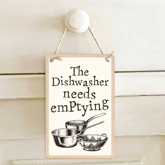 The dishwasher needs emptying / The dishwasher needs loading - Double-sided wooden mini sign.

Made from certified sustainable wood and printed on both sides with a fun, practical message and retro illustration.

15 × 10 cm sustainable wood, natural twine.
Light and durable, eco-friendly, ready to hang.

Made in Suffolk.
