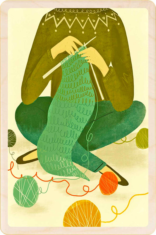 Illustrated wooden postcard depicting a scene with a person knitting, featuring yarn balls, needles, and a cozy setting. Knitting - Sustainable Card - Wooden postcard

Illustration by Emy Lou Holmes, printed in Suffolk on sustainably sourced wood. Eco-friendly card to send, gift and display.