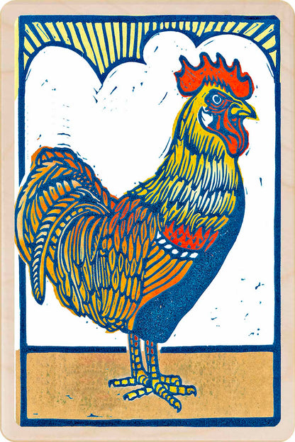 'Sunrise Cockerel' printed in Suffolk on sustainably sourced wood. A lasting postcard you can send, gift, or display.