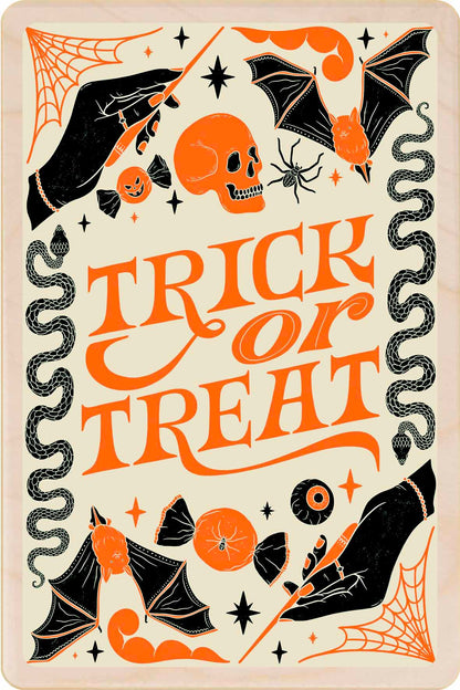A wooden postcard featuring Halloween-themed illustrations including a skull, bats, and pumpkins, and the text 'TRICK OR TREAT'. Trick or Treat!&nbsp; Sustainable Card - Wooden Postcard

Made in Suffolk on sustainably sourced wood. Eco-friendly card to send, gift and display.