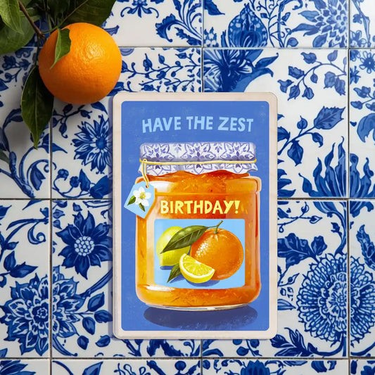 Birthday card: Jar of orange marmalade with 'Have the Zest Birthday!' label on a blue background - the wooden postcard company