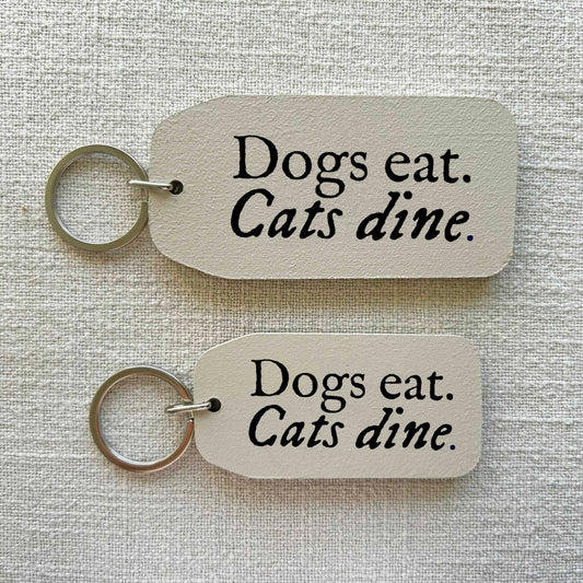 DOGS EAT, CATS DINE