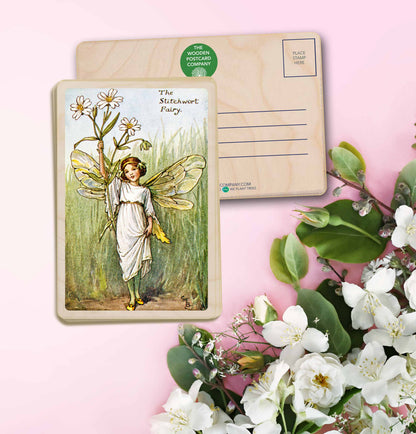 Stitchwort Fairy by Cicely Mary Barker. Printed with vibrant colour and fine detail. Made to send, keep, or collect. Handmade in the UK since 2012.