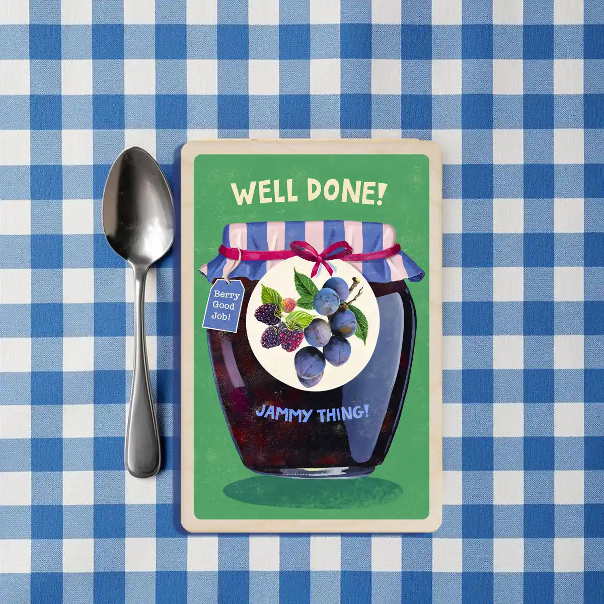 Congratulation Card with a jar of jam and text 'Well Done! Jammy Thing!' on a green background - the wooden postcard company