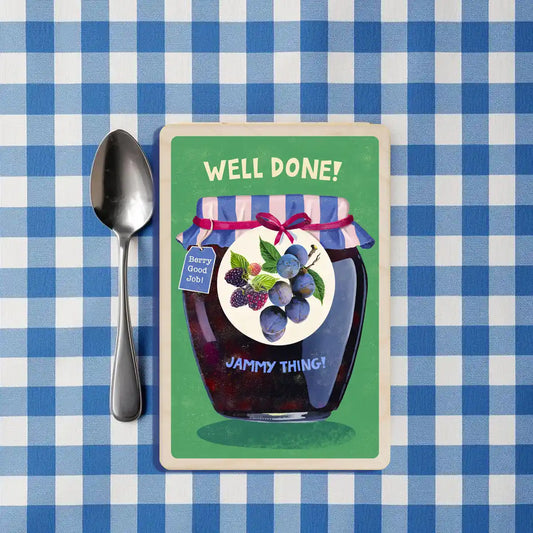 Congratulation Card with a jar of jam and text 'Well Done! Jammy Thing!' on a green background - the wooden postcard company